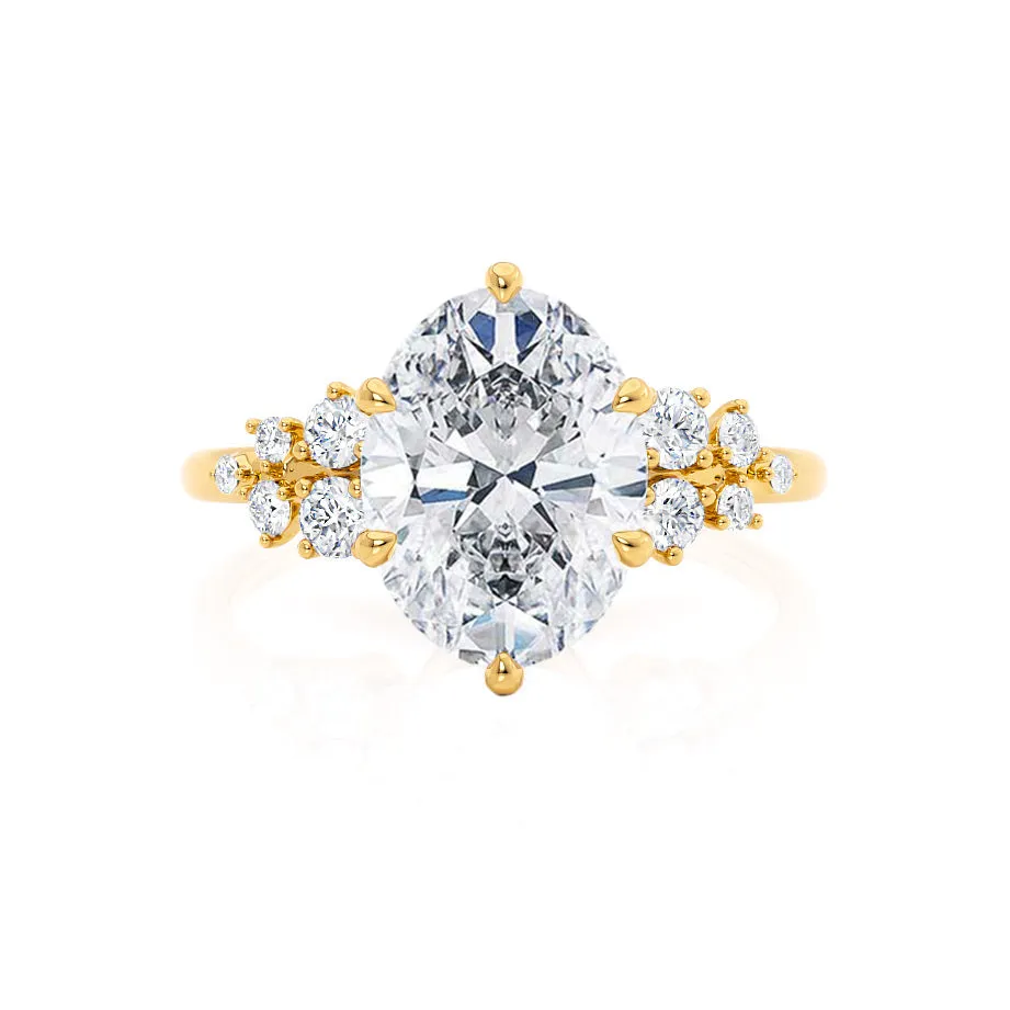 ALYA - Oval Moissanite Starburst Cluster Shoulder Set Engagement Ring 18k Yellow Gold