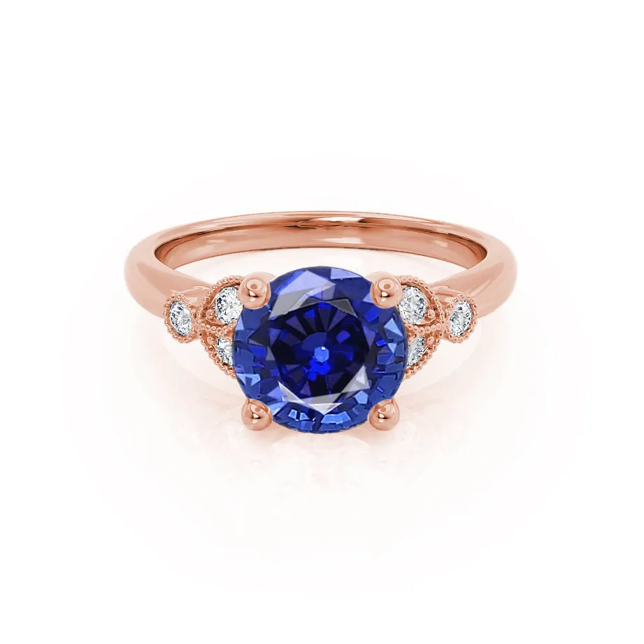 DELILAH - Chatham® Round Blue Sapphire 18k Rose Gold Shoulder Set Ring