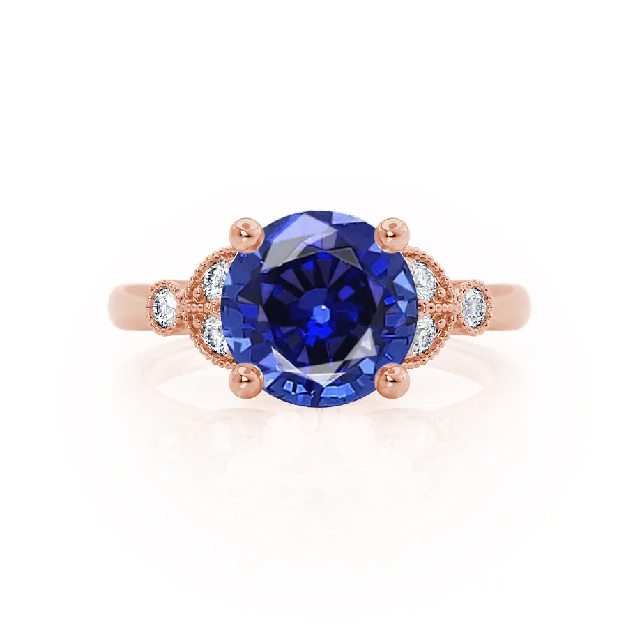 DELILAH - Chatham® Round Blue Sapphire 18k Rose Gold Shoulder Set Ring