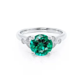 DELILAH - Chatham® Round Emerald 950 Platinum Shoulder Set Ring