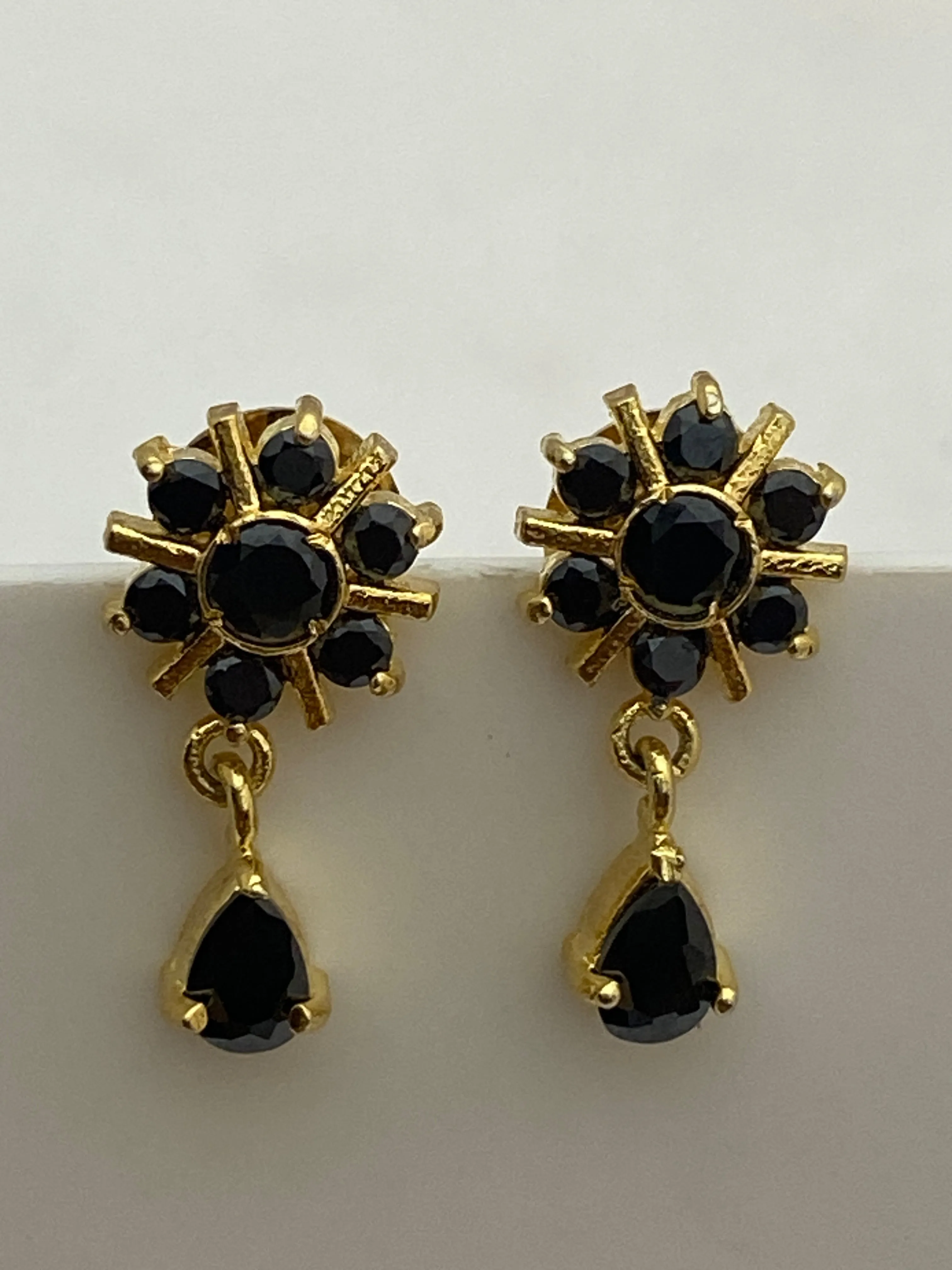 Elegant Black Stone Gold Plated Studded Floral Earrings